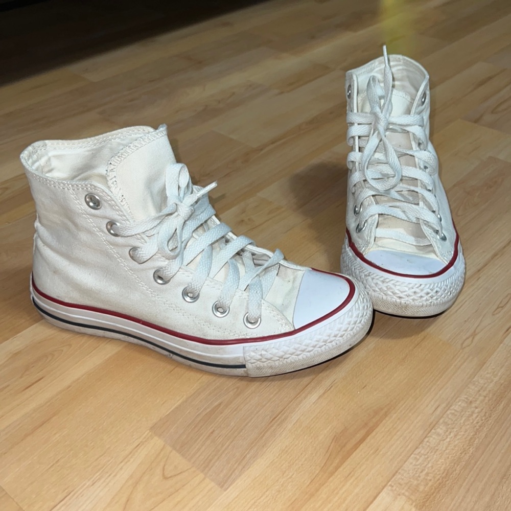 White high top converse.